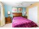 Guest bedroom with queen bed and updated furnishings at 4525 Stella St, Kissimmee, FL 34746