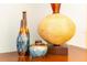 Tabletop decor with three ceramic vases and a lamp at 4525 Stella St, Kissimmee, FL 34746