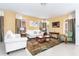 Spacious living room with ample natural light and stylish furnishings at 4525 Stella St, Kissimmee, FL 34746