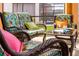 Relaxing patio furniture with colorful cushions creates an outdoor oasis at 4525 Stella St, Kissimmee, FL 34746
