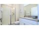 Bathroom with walk-in shower and single vanity at 4976 Windermere Ave, Kissimmee, FL 34746