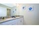 Modern bathroom with double sinks and updated vanity at 4976 Windermere Ave, Kissimmee, FL 34746