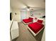 Comfortable bedroom with two beds, modern decor, and a fun, themed atmosphere at 4976 Windermere Ave, Kissimmee, FL 34746