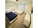 Cozy bedroom featuring twin beds, soft lighting, and a serene ambiance at 4976 Windermere Ave, Kissimmee, FL 34746
