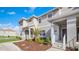 Modern 2 story home with gray exterior, walkway, and landscaping at 4976 Windermere Ave, Kissimmee, FL 34746