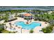 Resort-style pool with multiple areas for swimming and relaxing at 4976 Windermere Ave, Kissimmee, FL 34746
