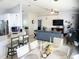 Open concept dining room with kitchen and living room access at 509 Drayton Rd, Winter Haven, FL 33884