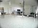 Sleek kitchen island with white quartz countertops at 509 Drayton Rd, Winter Haven, FL 33884