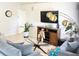 Spacious living room with gray sofas and a large TV at 509 Drayton Rd, Winter Haven, FL 33884