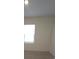 Bright bedroom with window and neutral wall at 522 Noble Ave, Davenport, FL 33837