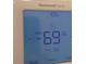 Honeywell Home thermostat displaying 69 degrees at 522 Noble Ave, Davenport, FL 33837