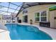 Inviting screened pool area with plenty of space for relaxation at 569 Eagle Pointe South, Kissimmee, FL 34746