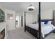 Bright bedroom with ensuite bathroom access at 709 Centervale Dr, Celebration, FL 34747
