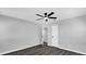 Bedroom with ceiling fan and dark hardwood floors at 740 Baltimore Dr, Orlando, FL 32810