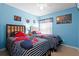 Bedroom with twin beds and Spiderman theme at 7833 Turkey Oak Ln, Kissimmee, FL 34747