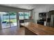 Modern kitchen with butcher block island and stainless steel appliances at 802 Lindenwald Ln, Altamonte Springs, FL 32701