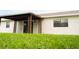 Backyard with covered patio at 827 Albi Ct, Kissimmee, FL 34759