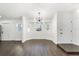Bright dining room featuring modern lighting and large windows at 827 Albi Ct, Kissimmee, FL 34759