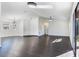 Spacious living room with dark floors and recessed lighting at 827 Albi Ct, Kissimmee, FL 34759
