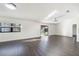 Spacious living room with lots of natural light and wood floors at 827 Albi Ct, Kissimmee, FL 34759