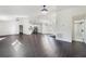 Open-concept living space showcasing natural light and wood floors at 827 Albi Ct, Kissimmee, FL 34759
