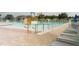Community pool featuring a splash pad and plenty of seating at 827 Albi Ct, Kissimmee, FL 34759