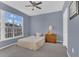 Spacious bedroom with large window, plush bed, and ample floor space at 8301 Elm Park Dr # 634, Orlando, FL 32821