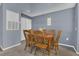 Dining room with wood table and chairs at 8301 Elm Park Dr # 634, Orlando, FL 32821