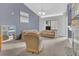 Living room with vaulted ceiling and neutral decor at 8301 Elm Park Dr # 634, Orlando, FL 32821