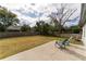 Spacious backyard with patio and grassy area at 937 Elkcam Blvd, Deltona, FL 32725