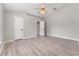 Main bedroom with high ceiling, ceiling fan and en-suite bathroom at 937 Elkcam Blvd, Deltona, FL 32725