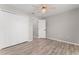 Bright bedroom with double door closet and wood-look flooring at 937 Elkcam Blvd, Deltona, FL 32725