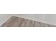 Light brown wood-look vinyl plank flooring at 937 Elkcam Blvd, Deltona, FL 32725
