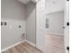 Laundry room with access to additional bedroom at 937 Elkcam Blvd, Deltona, FL 32725