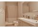Simple bathroom with double vanity and shower at 9850 Hidden Dunes Ln, Orlando, FL 32832