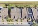 Aerial view of townhouses with solar panels at 1009 Wood Cv, Kissimmee, FL 34743
