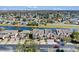 Aerial view of townhouses and lake at 1009 Wood Cv, Kissimmee, FL 34743