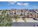 Row of townhouses with solar panels and lush landscaping at 1009 Wood Cv, Kissimmee, FL 34743