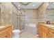 Bathroom with a large shower, soaking tub, and updated fixtures at 1009 Wood Cv, Kissimmee, FL 34743