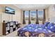 Comfortable bedroom with a king-size bed and plenty of closet space at 1009 Wood Cv, Kissimmee, FL 34743