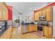 Open concept kitchen with island and stainless steel appliances at 1009 Wood Cv, Kissimmee, FL 34743
