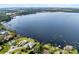 Beautiful aerial view of lakeside homes with private docks and stunning waterfront scenery at 1150 Eden Dr, St Cloud, FL 34771