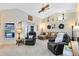 Comfortable living room with vaulted ceilings and shiplap accent wall at 1150 Eden Dr, St Cloud, FL 34771