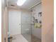 Bathroom featuring a glass shower with dual shower heads, a tiled floor, and a white vanity at 123 Lakeview Dr, Auburndale, FL 33823