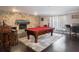 Game room showcasing a pool table, stone fireplace, and a bar area, perfect for entertaining guests at 123 Lakeview Dr, Auburndale, FL 33823