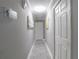Hallway features tiled floors and white doors at 123 Lakeview Dr, Auburndale, FL 33823