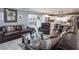 Open-concept layout connecting the living room to the kitchen area and showing a view of the outdoor pool at 123 Lakeview Dr, Auburndale, FL 33823