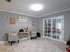 Bright living room with tile floors and gray walls at 123 Lakeview Dr, Auburndale, FL 33823