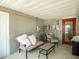 Relaxing screened patio with comfortable seating and a view of the yard at 123 Lakeview Dr, Auburndale, FL 33823
