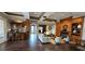 Inviting clubhouse showcasing cozy seating, a fireplace, and a convenient kitchenette at 14214 Fredricksburg Dr # 106, Orlando, FL 32837